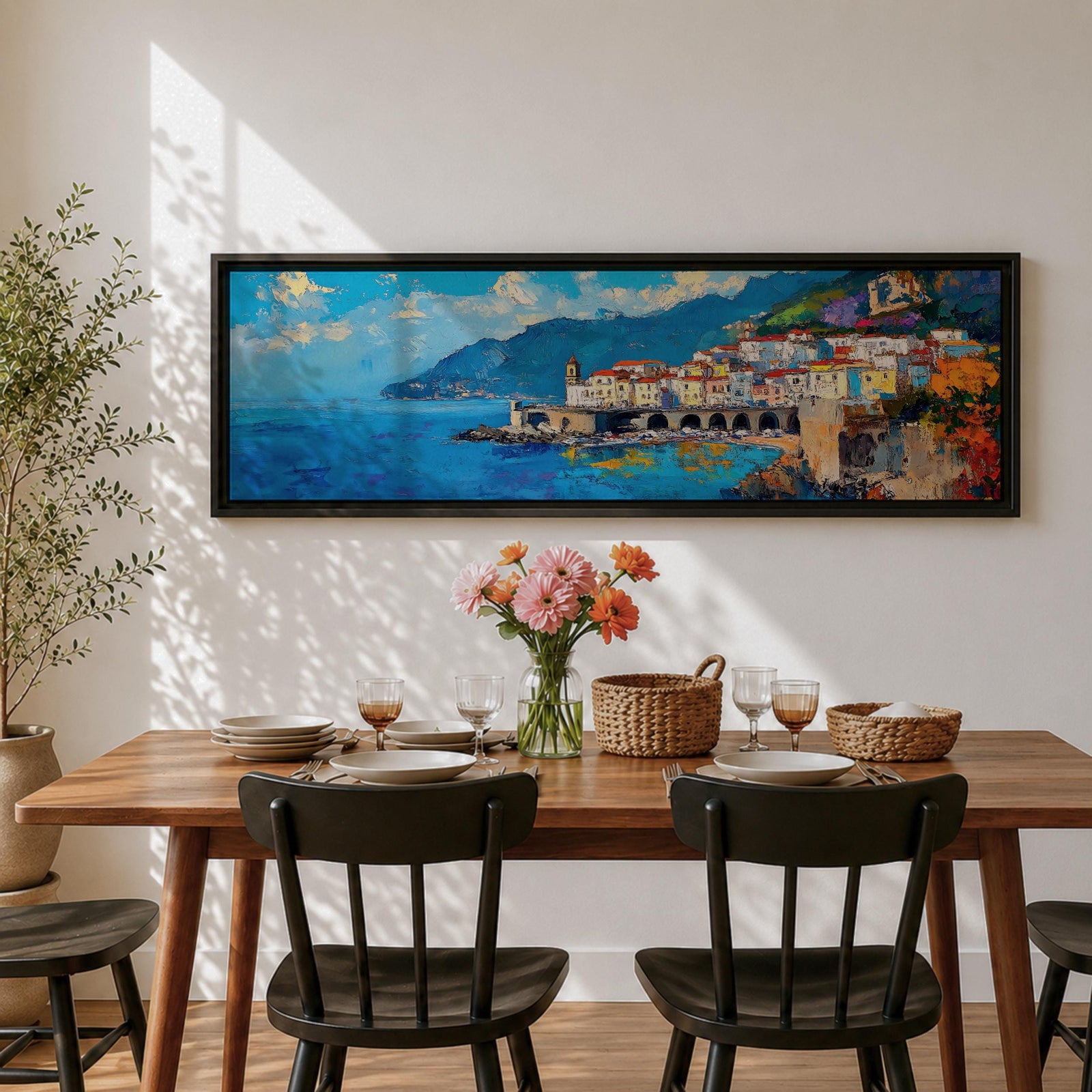 Panoramic Mediterranean coastal painting of the Amalfi Coast featuring colorful hillside houses overlooking bright blue sea. A stone harbor with arches and boats sits along the shoreline while mountains rise in the background beneath a clear sky with scattered clouds across the wide horizontal seaside composition.