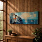 Panoramic Mediterranean coastal painting showing white cliffside houses overlooking deep blue sea at sunset. A sailboat drifts across calm water while sunlight reflects across the horizon and textured brushstrokes form dramatic rocky cliffs and coastal architecture in the wide horizontal seaside composition.