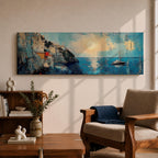 Panoramic Mediterranean coastal painting showing white cliffside houses overlooking deep blue sea at sunset. A sailboat drifts across calm water while sunlight reflects across the horizon and textured brushstrokes form dramatic rocky cliffs and coastal architecture in the wide horizontal seaside composition.