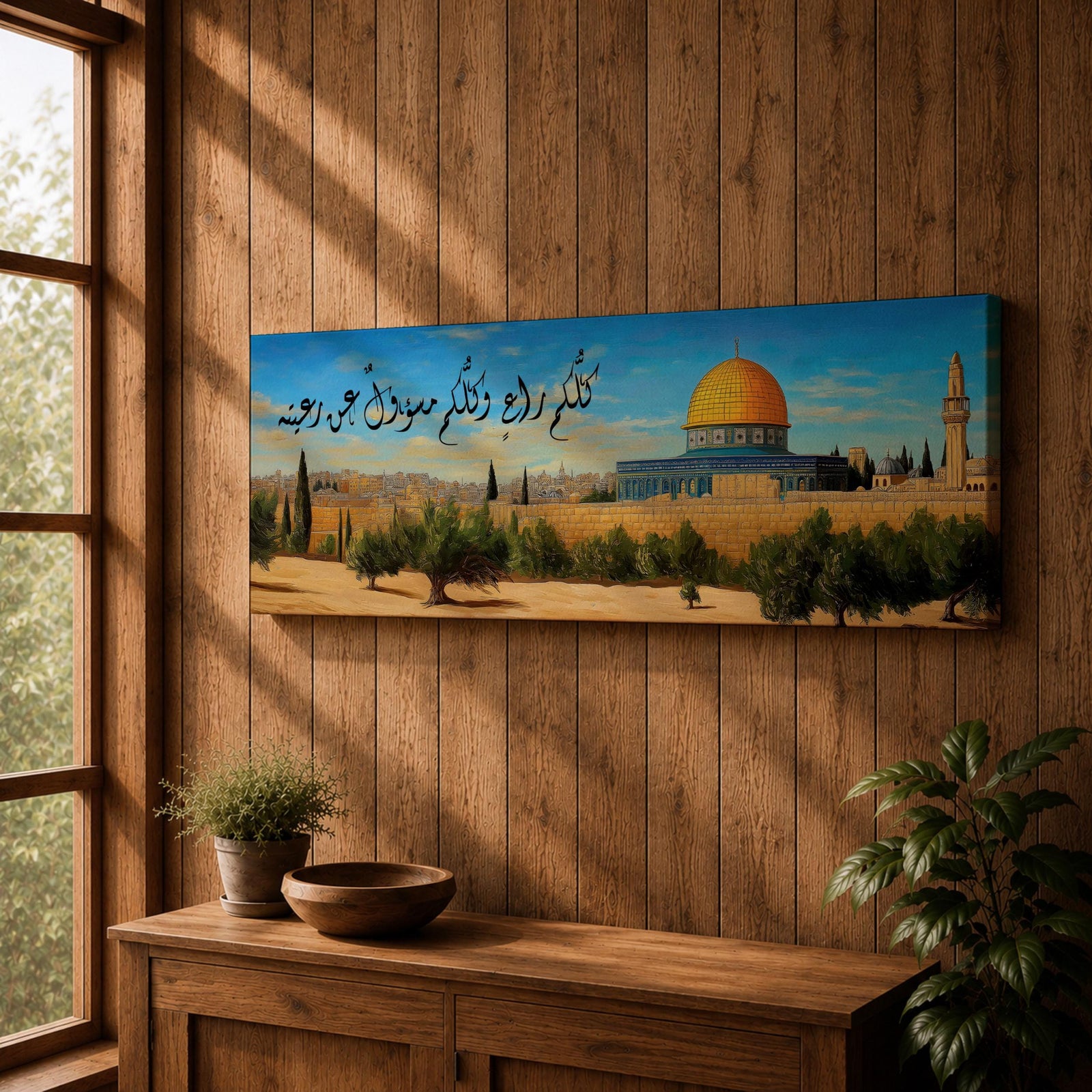 A long narrow panoramic painting depicts Masjid Al Aqsa with its iconic golden dome rising above stone walls and surrounding trees, set against a clear sky with Arabic calligraphy flowing across the upper composition, rendered in a detailed painterly style that blends architectural precision with warm tones and a serene landscape atmosphere.