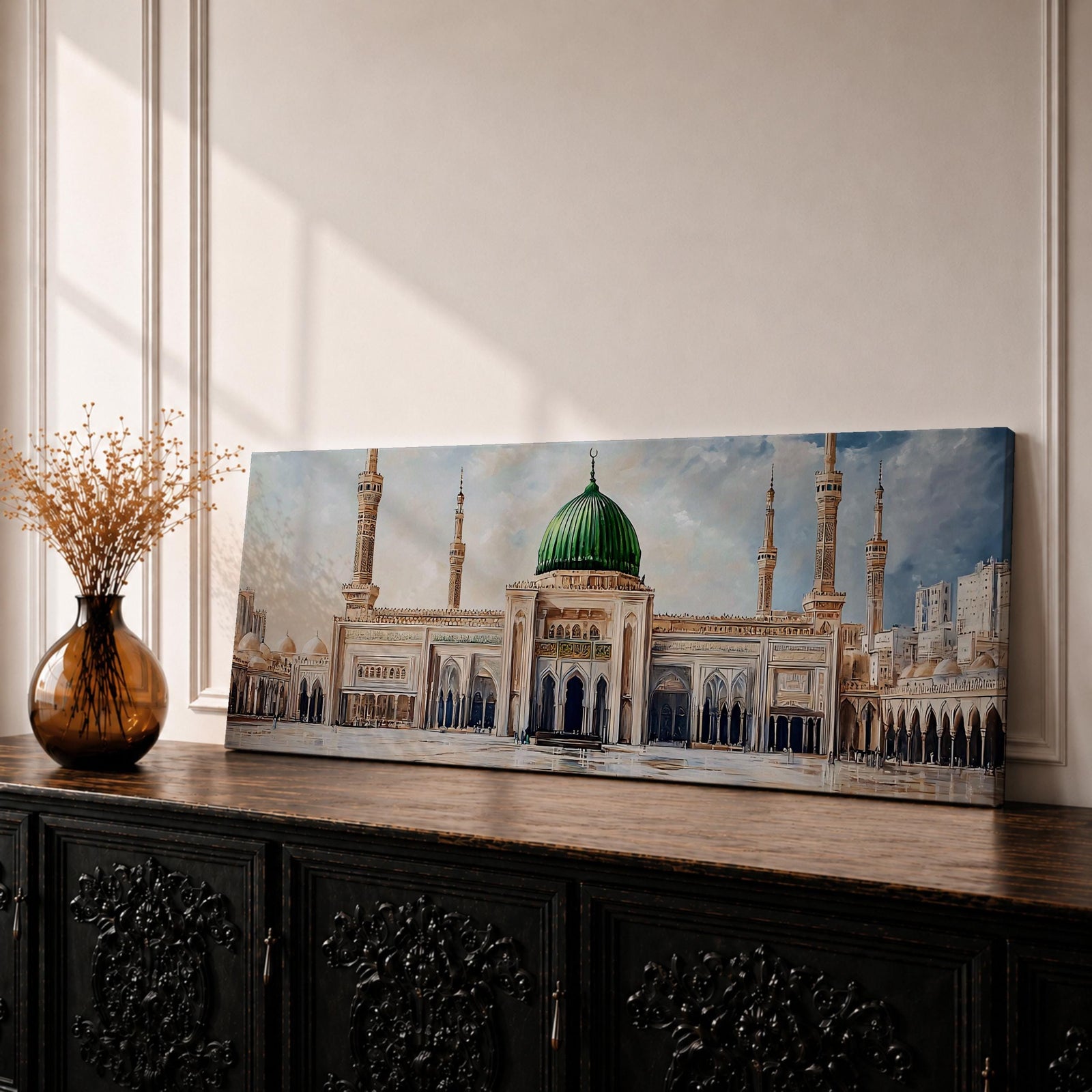 Panoramic architectural painting of Masjid Nabawi in Medina featuring the iconic green dome centered among elegant minarets and grand mosque arches. The courtyard stretches across the composition while soft clouds gather above the sacred structure, highlighting detailed Islamic architecture across the wide skyline.