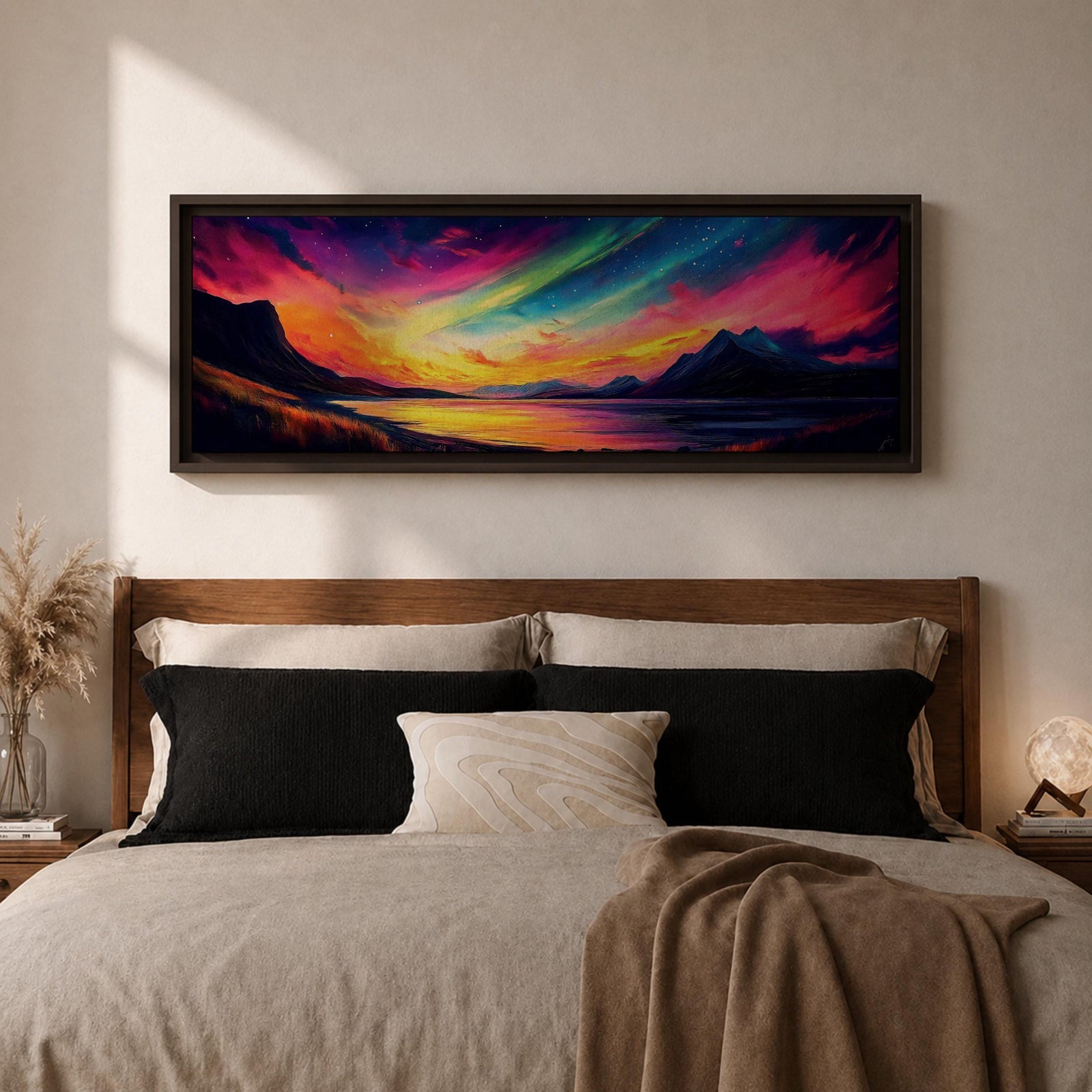 Panoramic northern lights landscape painting showing vibrant aurora borealis ribbons sweeping across a night sky in bright greens pinks and purples. Dark mountain silhouettes frame a reflective lake while glowing colors spread across the horizon creating a dramatic wide arctic night scene.