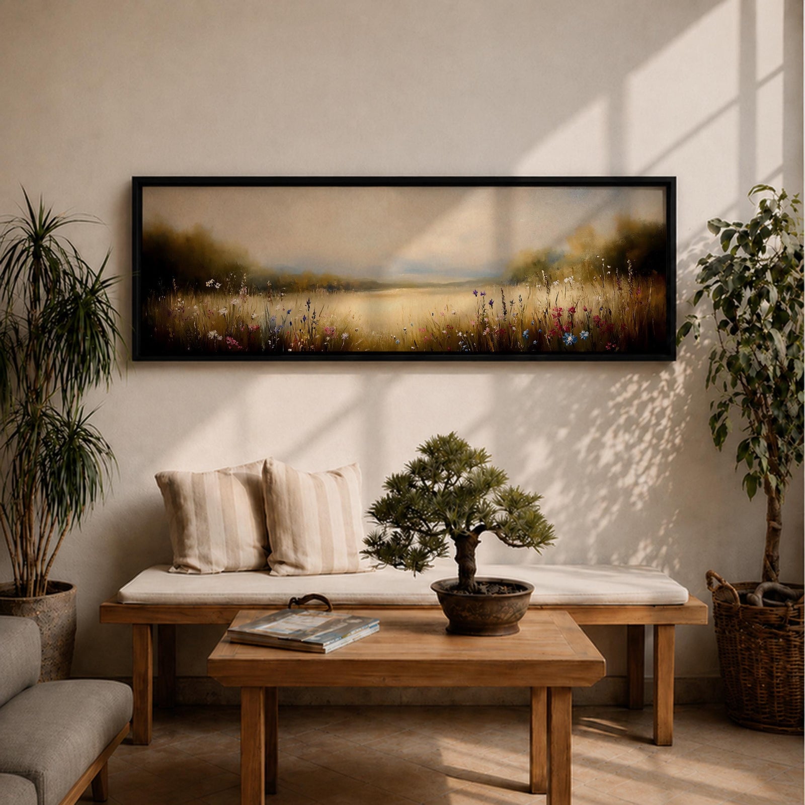 Panoramic meadow landscape painting showing soft golden grasses and delicate wildflowers across an open countryside field with distant trees and a glowing sky creating a peaceful prairie scene.