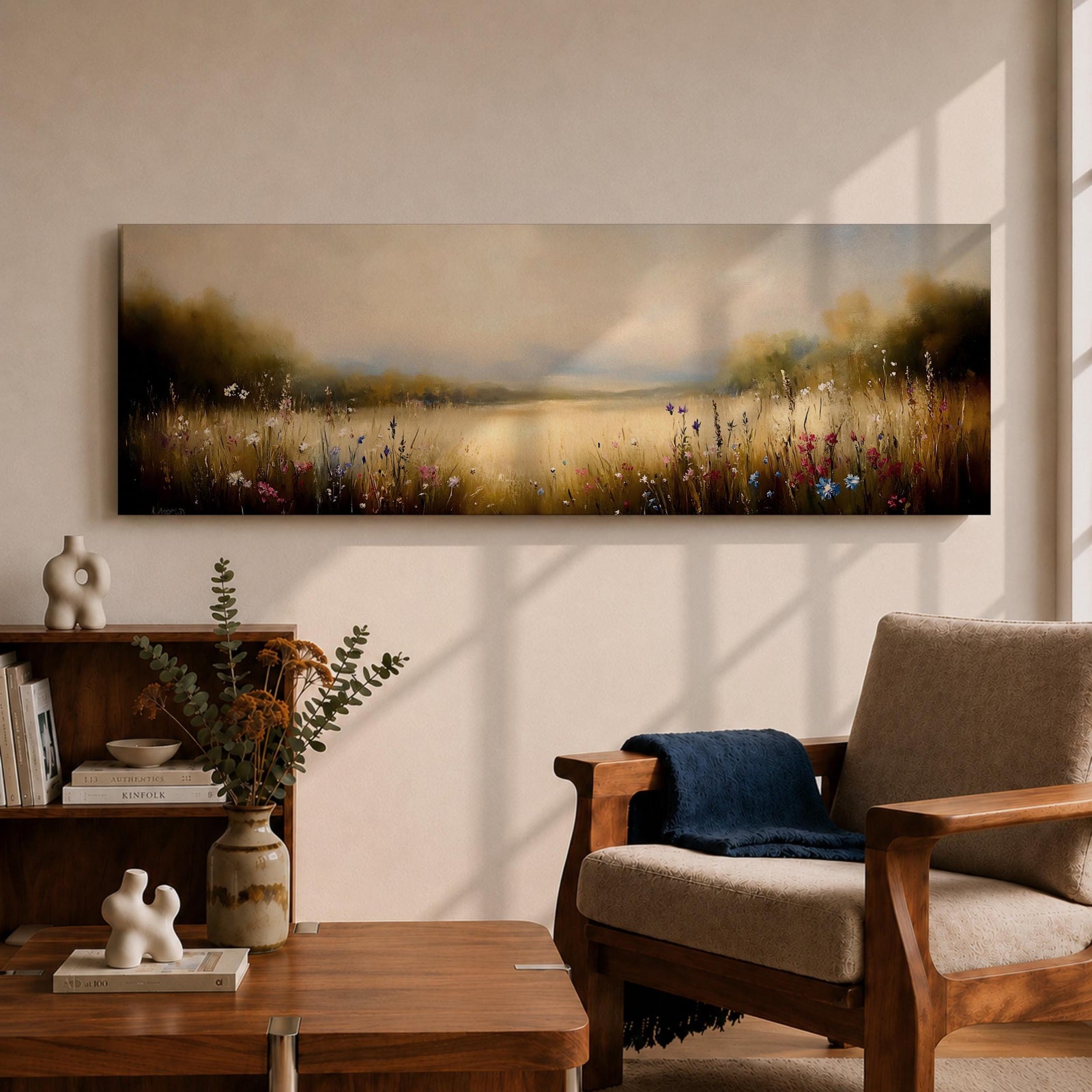 Panoramic meadow landscape painting showing soft golden grasses and delicate wildflowers across an open countryside field with distant trees and a glowing sky creating a peaceful prairie scene.