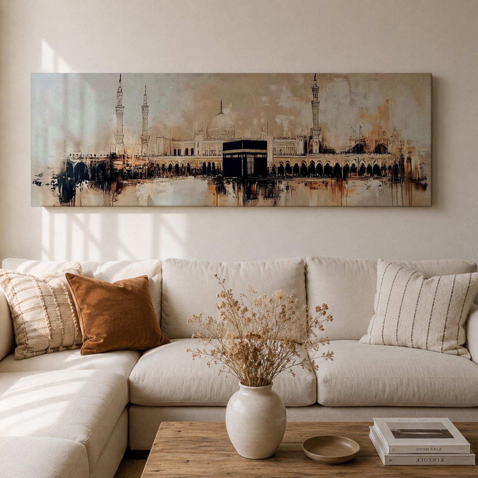 Panoramic painting of the Kaaba at Masjid al Haram with surrounding mosque arches and minarets, rendered in a loose abstract style with warm beige, brown, and black tones. The composition stretches horizontally with expressive brush textures, architectural silhouettes, and layered strokes highlighting the Kaaba at the center of the sacred mosque complex.