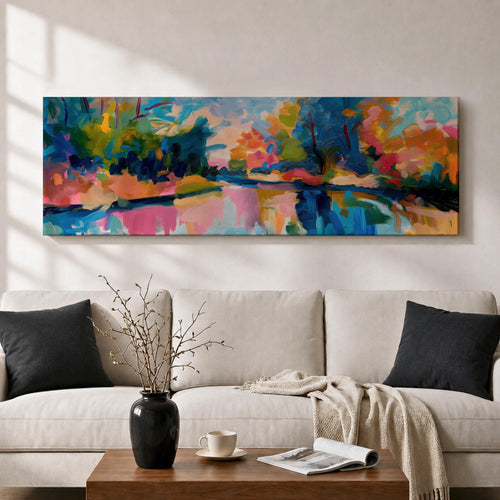 Panoramic abstract landscape painting featuring expressive brushstrokes and vivid colors portraying trees and foliage surrounding a calm reflective river, with bright tones of blue, pink, orange, green, and yellow blending across sky and water to create a contemporary impressionistic nature scene with dynamic movement and layered texture.