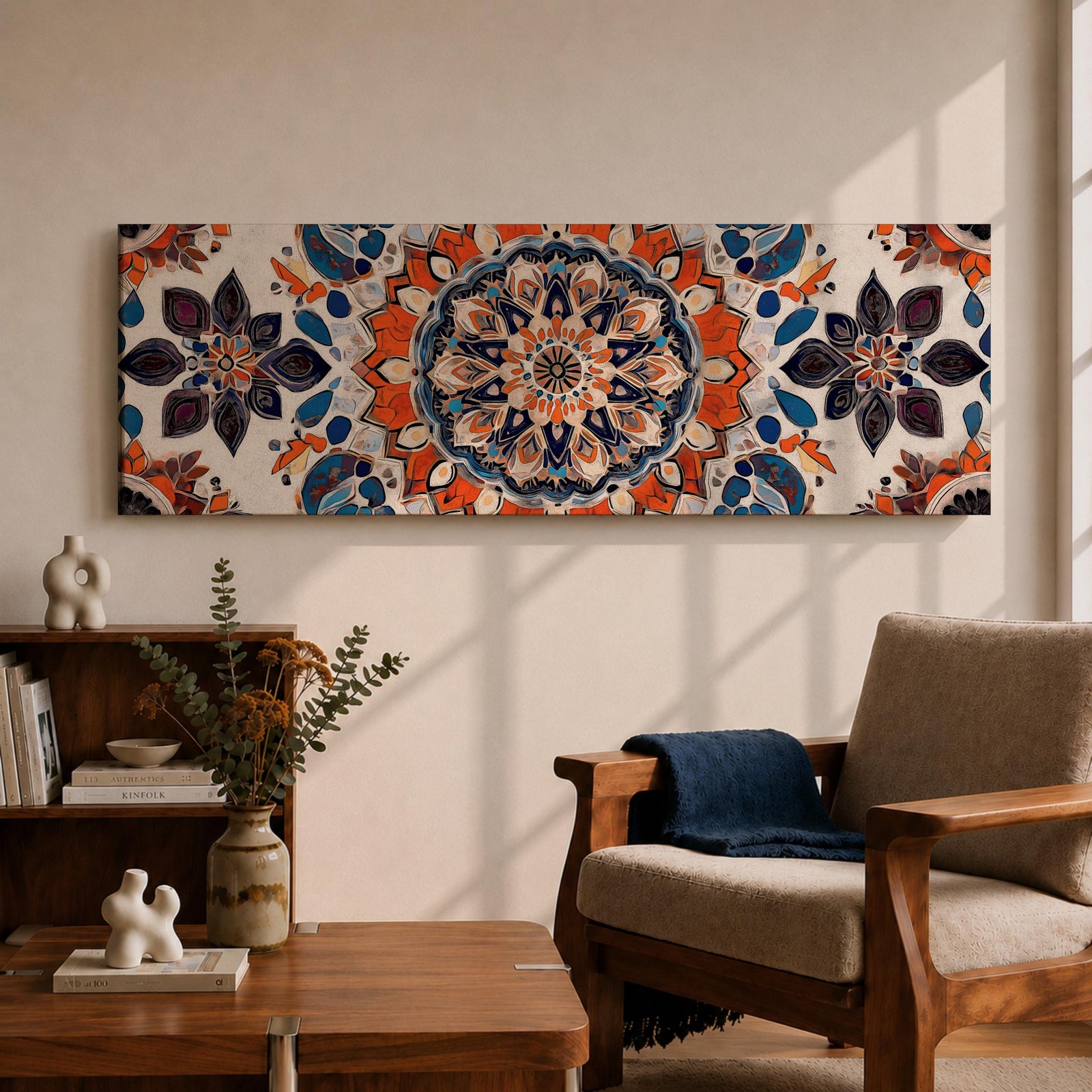 Panoramic artwork displaying an intricate Islamic mandala composed of symmetrical Moorish geometric and floral motifs radiating from a central rosette, featuring layered arabesque shapes and zellige inspired tile patterns in orange, blue, cream, and dark accents arranged in a balanced ornamental composition.