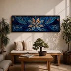 Panoramic floral mandala artwork featuring a symmetrical lotus flower design with layered petals spreading outward in deep blue and gold tones, accented with delicate botanical shapes and watercolor textures that create an intricate ornamental pattern across a wide horizontal composition.