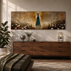 Panoramic religious painting depicting the Virgin Mary standing in a glowing field of white flowers with hands gently clasped in prayer, wearing a flowing robe and veil illuminated by radiant golden light forming a halo behind her, surrounded by soft natural scenery rendered in warm earthy tones and expressive brushstrokes.