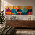 Panoramic artwork depicting a row of colorful Islamic mosque domes and arches rendered in vibrant watercolor style, featuring intricate geometric patterns and ornamental details in shades of turquoise, orange, pink, and gold forming a stylized architectural skyline inspired by Middle Eastern and Arabic design.
