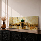 Panoramic painting depicting Masjid Al Nabawi in Medina with its iconic green dome and surrounding minarets rising above golden mosque architecture, rendered with textured brushstrokes and warm earth tones reflecting across calm water beneath a softly illuminated sky.