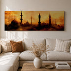 Panoramic artwork depicting a dramatic skyline of mosque domes and tall minarets silhouetted against a glowing golden sunset sky, with warm amber and orange tones diffused through atmospheric haze creating a striking Islamic architectural horizon.