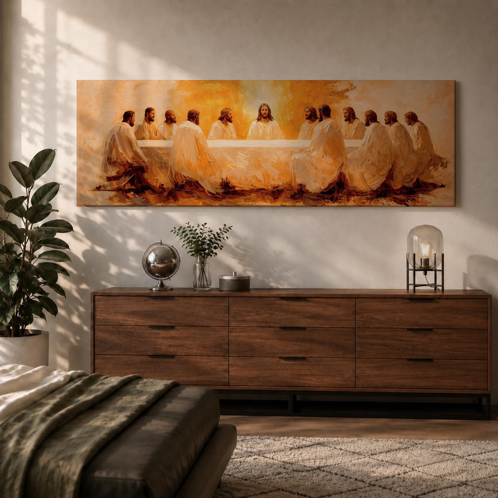 Panoramic religious painting depicting Jesus and the twelve disciples gathered around the Last Supper table illuminated by warm golden light, creating a sacred Christian biblical scene.
