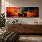 Panoramic artwork depicting the Kaaba in Mecca inside Masjid al-Haram surrounded by mosque arches and minarets with dramatic abstract sunset colors and glowing atmospheric light.