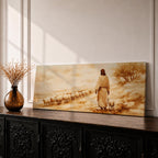 A panoramic painting of Jesus walking along a dusty hillside guiding a long line of sheep across a warm desert landscape, depicted from behind in flowing robes as the flock follows along the path beneath a soft glowing sky, rendered in a calm painterly style with earthy tones and gentle light across the scene.