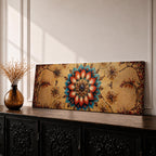 A panoramic ornamental painting featuring a detailed Islamic mandala with layered floral petals and geometric arabesque patterns radiating from a central rosette, rendered in rich turquoise, coral, and gold tones against a textured warm background with symmetrical decorative motifs extending across the horizontal composition.
