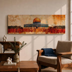 A panoramic abstract painting of the Dome of the Rock with its golden dome rising above the historic structure, rendered in textured brushstrokes with warm ochre, rust, and gold tones blending into a distressed background while dark silhouettes of trees and landscape stretch across the horizontal composition.