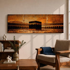 A panoramic vintage style painting of the Kaaba at the center of Masjid al Haram in Mecca surrounded by sweeping arcades and tall minarets, with large crowds of worshippers gathered around the sacred cube beneath a warm sepia sky that creates an aged historic atmosphere across the wide composition.