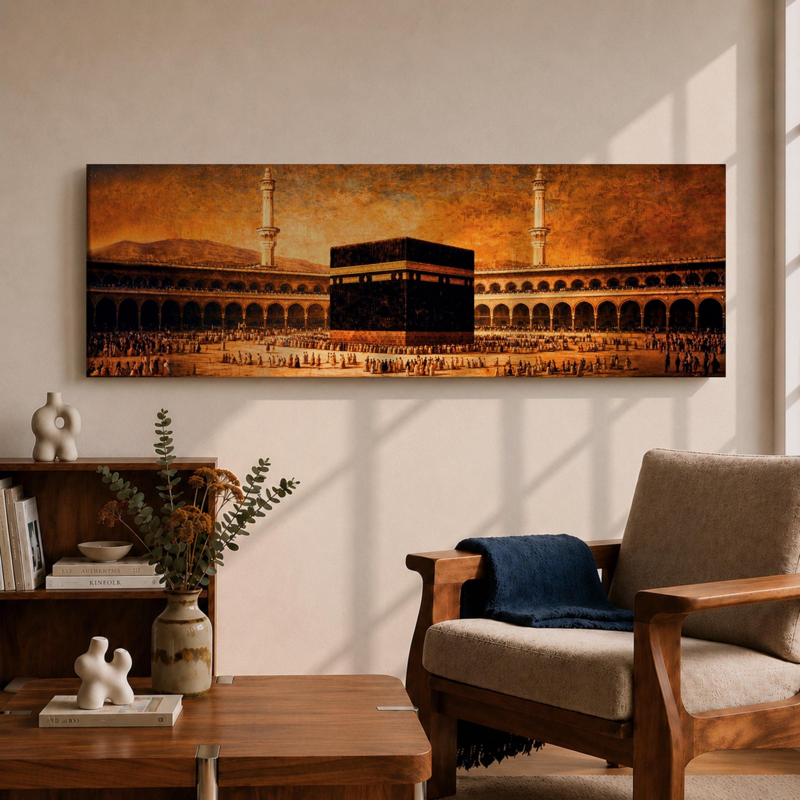 A panoramic vintage style painting of the Kaaba at the center of Masjid al Haram in Mecca surrounded by sweeping arcades and tall minarets, with large crowds of worshippers gathered around the sacred cube beneath a warm sepia sky that creates an aged historic atmosphere across the wide composition.