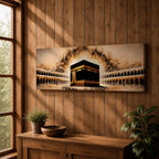 A panoramic painting of the Kaaba at the center of Masjid Al Haram surrounded by arched colonnades and glowing golden light radiating behind the sacred structure, with warm sepia tones and textured brushstrokes creating a dramatic illuminated atmosphere across the wide composition.