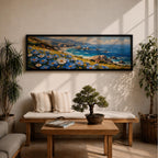 A panoramic coastal landscape painting showing blue and white wildflowers blooming along a grassy cliff overlooking a rocky shoreline and deep blue ocean waves, with distant mountains and scattered sea stacks beneath a bright sky stretching across the wide horizontal composition.