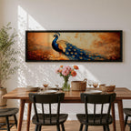 A long panoramic painting of a vibrant peacock standing in an autumn landscape with its long blue and gold tail feathers flowing across the composition. The bird displays detailed eye patterned plumage while warm sunset tones and delicate foliage create a serene nature scene in a wide horizontal format.