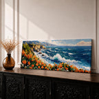 A long panoramic coastal painting showing ocean waves crashing against rocky cliffs while bright orange wildflowers bloom along the shoreline. Deep blue water and white sea foam move toward the coast beneath a clear sky, creating a vibrant seascape landscape in a wide horizontal composition.