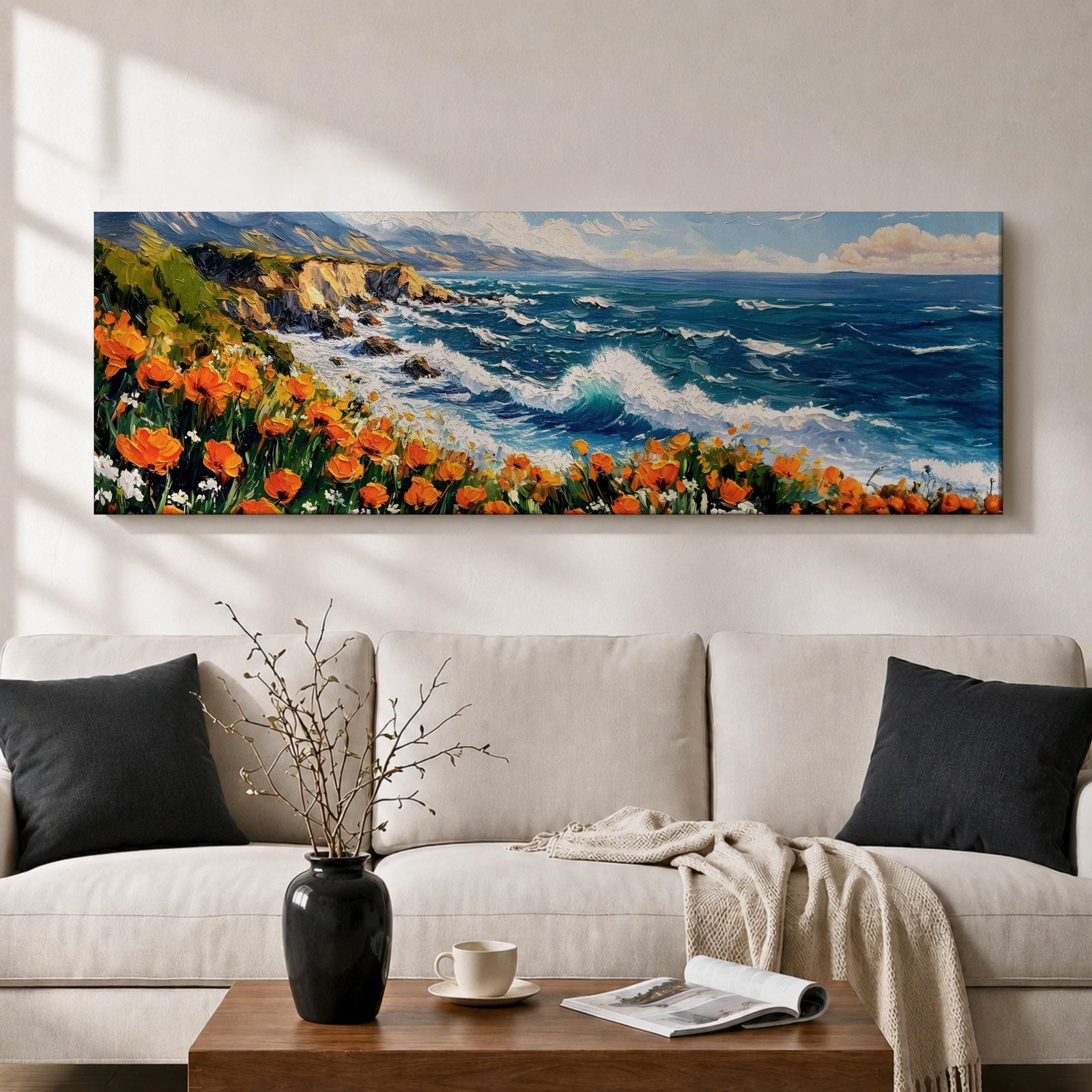 A long panoramic coastal painting showing ocean waves crashing against rocky cliffs while bright orange wildflowers bloom along the shoreline. Deep blue water and white sea foam move toward the coast beneath a clear sky, creating a vibrant seascape landscape in a wide horizontal composition.
