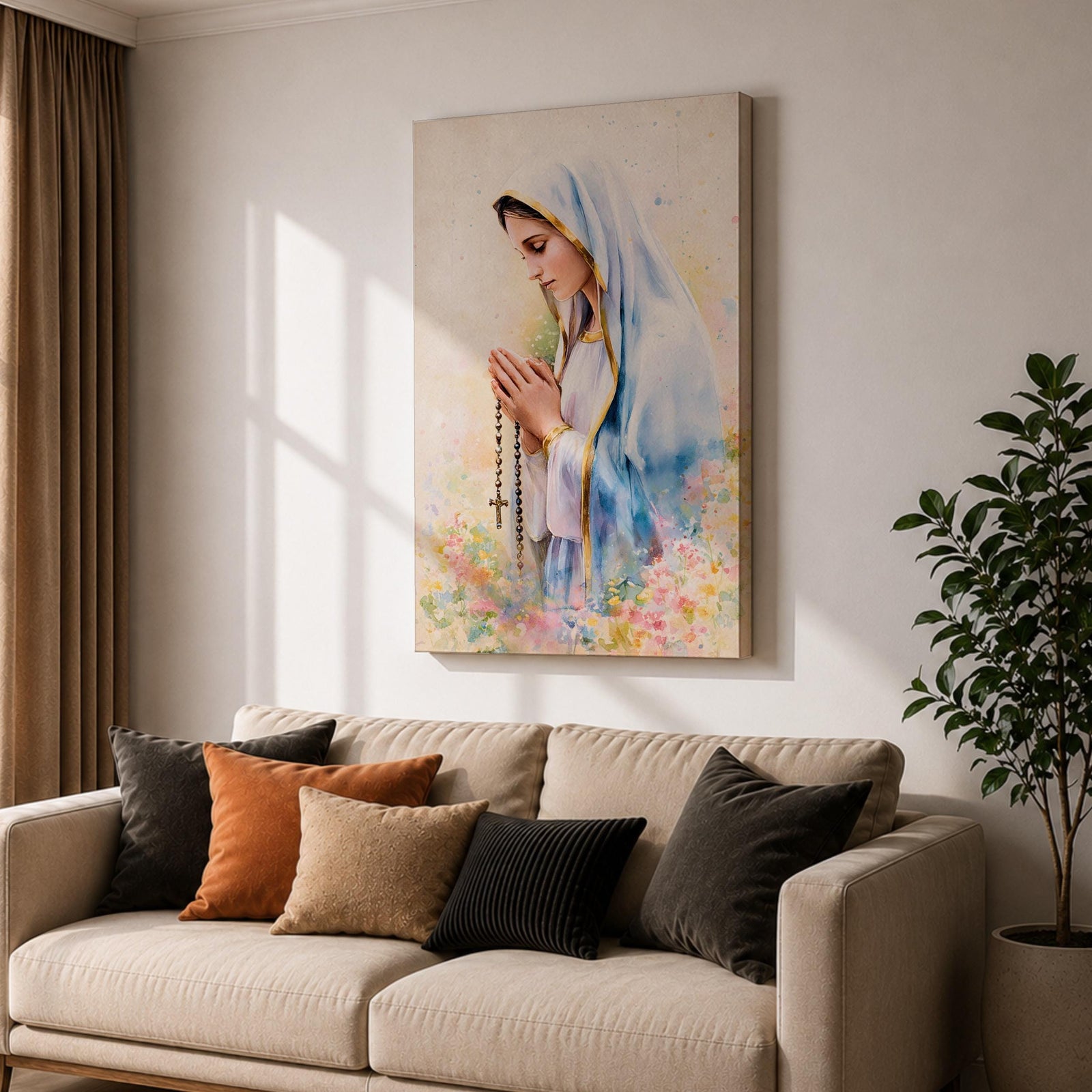 A watercolor style framed canvas depicting Virgin Mary in profile, wearing a blue and white veil with gold trim, holding a rosary and praying, surrounded by soft floral colors and a gentle light background.