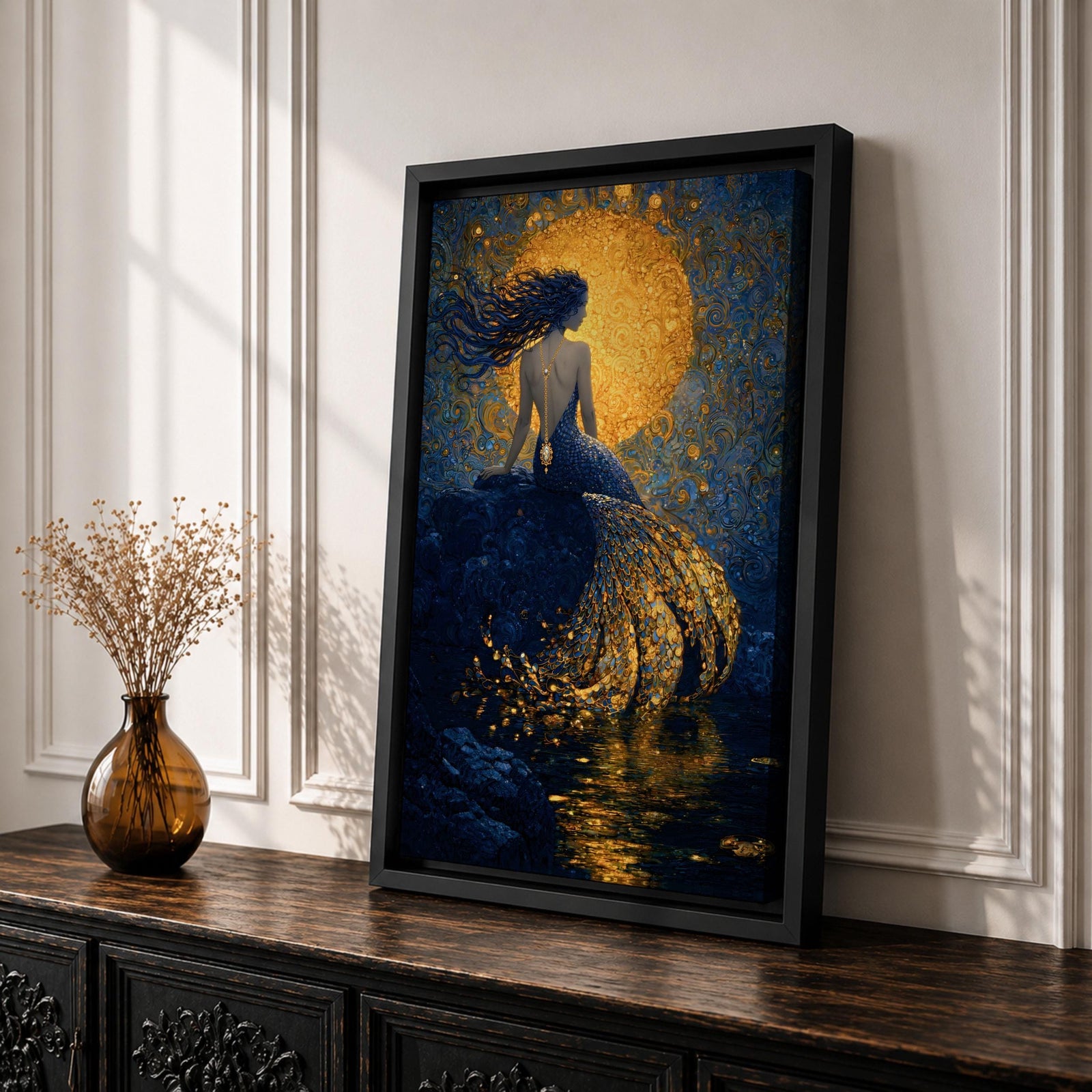 A rich fantasy painting of a mermaid seated on a rocky shore beneath a glowing golden moon, her long flowing hair swept to the side as her detailed tail shimmers with layered gold scales cascading into reflective water, set against deep blue swirling textures that create a dramatic and luminous ocean mythology scene.