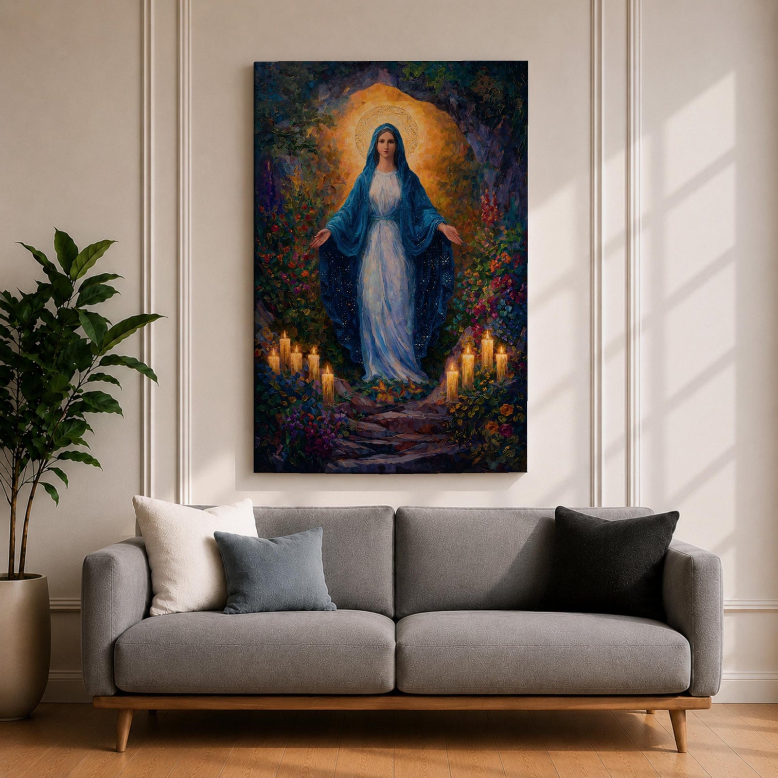 A framed canvas painting of Our Lady of Lourdes depicts the Virgin Mary standing with open arms surrounded by glowing candles and vibrant flowers, rendered in a richly detailed, realistic style with a luminous halo behind her head, evoking a serene and reverent atmosphere.