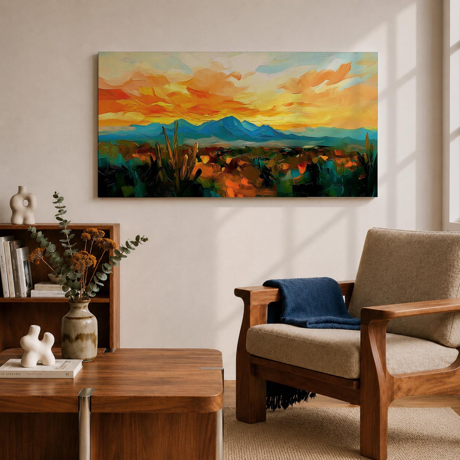 A panoramic desert landscape painting depicting a glowing sunset over layered mountain ranges and open terrain, with tall cacti silhouetted against a warm sky, rendered in textured brushstrokes that emphasize depth, horizon lines, and the expansive atmosphere of a southwest desert scene