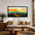 A panoramic desert landscape painting depicting a glowing sunset over layered mountain ranges and open terrain, with tall cacti silhouetted against a warm sky, rendered in textured brushstrokes that emphasize depth, horizon lines, and the expansive atmosphere of a southwest desert scene