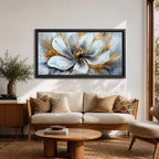 A panoramic abstract painting of a large white flower in full bloom, featuring layered petals with soft gray shading and a detailed textured center, accented by expressive gold brushstrokes that radiate outward, creating depth and contrast across a modern extra wide floral composition.