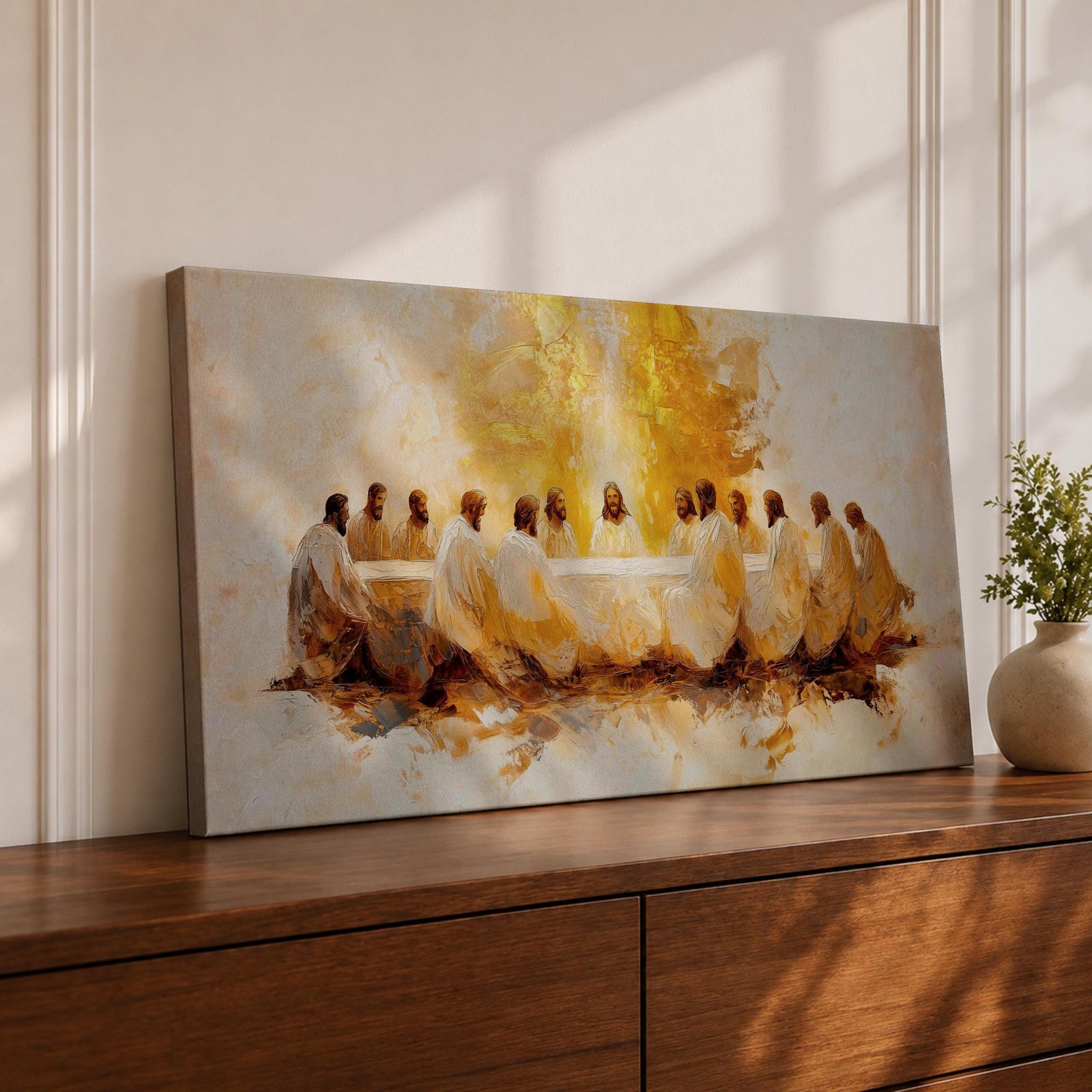 A panoramic painting of the Last Supper depicting Jesus seated at the center with his disciples gathered around a long table, rendered in a warm abstract style with soft golden tones, expressive brushwork, and a glowing central light that creates depth and focus across the wide composition.