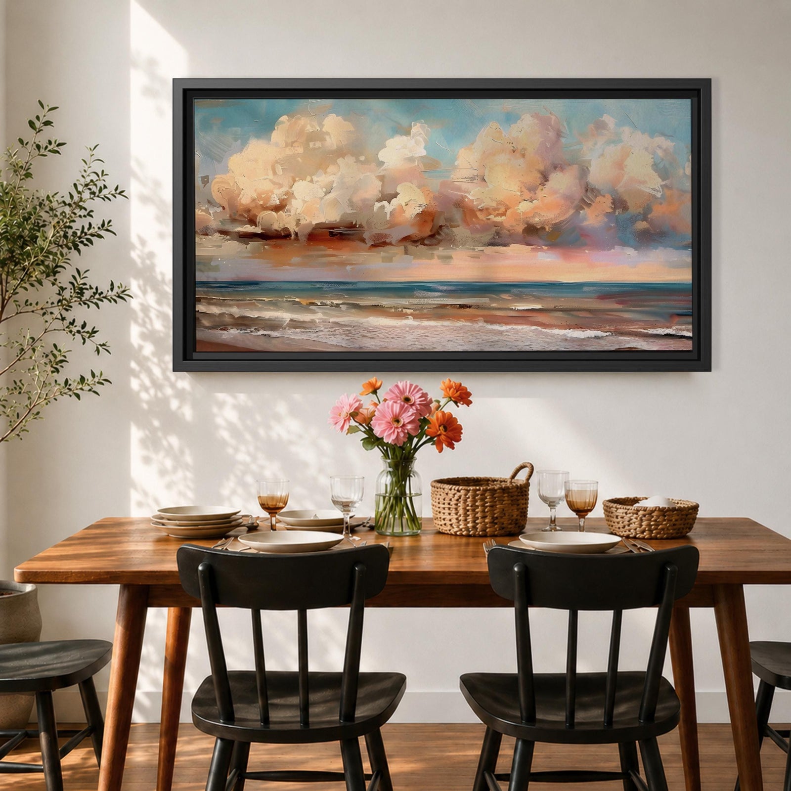 A panoramic impressionist seascape painting of ocean waves rolling onto shore beneath a vast sky filled with large dramatic clouds in soft peach, cream, and blue tones, with textured brushstrokes capturing light reflecting across the water and horizon, creating a serene yet dynamic coastal atmosphere.
