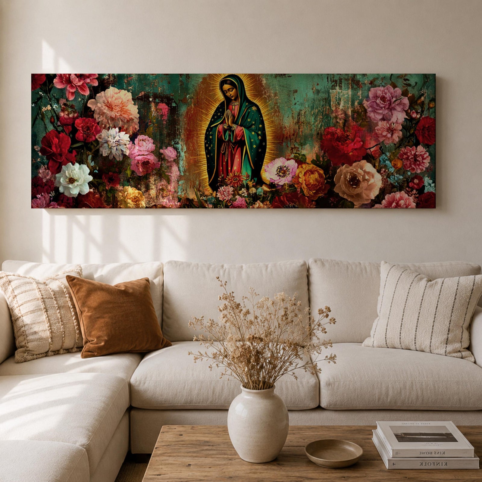 A long narrow panoramic painting shows Virgen de Guadalupe centered in prayer within a radiant halo, surrounded by richly detailed blooming flowers, with textured abstract layers and deep earthy tones blending with vibrant florals to create depth, contrast, and a luminous devotional focal point in an expressive style.