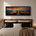 A long narrow panoramic painting depicts a wooden pier extending through tall grasses into calm ocean waters, leading toward a glowing sunset on the horizon, with bold textured brushstrokes and vivid color contrasts capturing reflections of warm light across the water and sky in an expressive contemporary style.