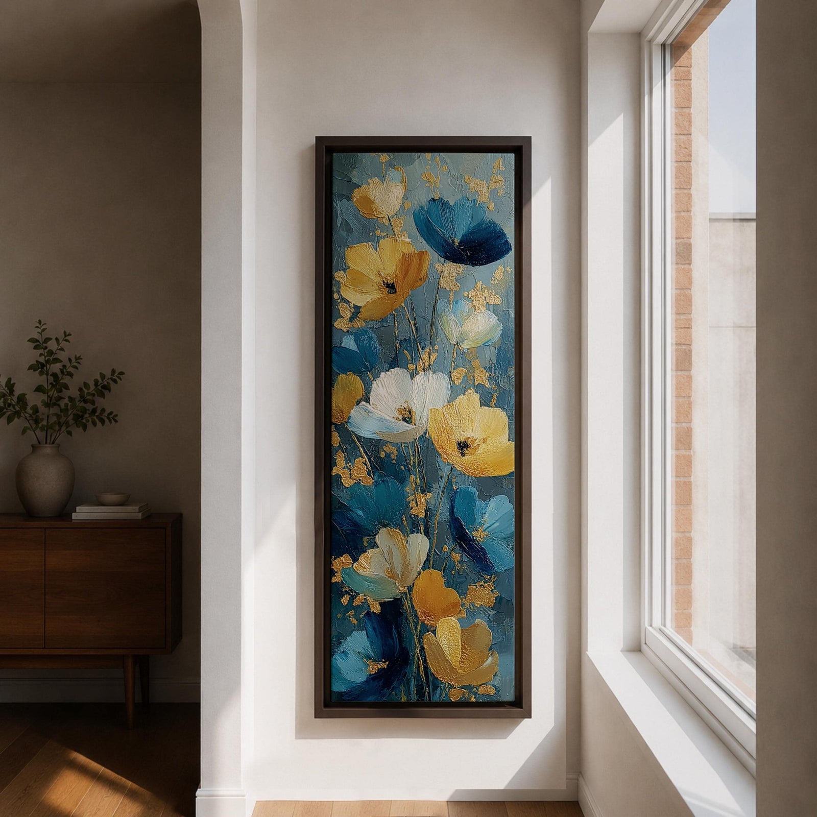 A tall, narrow vertical painting of stylized poppy flowers in layered teal, navy, gold, and soft white tones, featuring textured brushstrokes and metallic accents, with blooms rising along slender stems against a deep blue abstract background, creating a contemporary floral composition with rich contrast and flowing movement.
