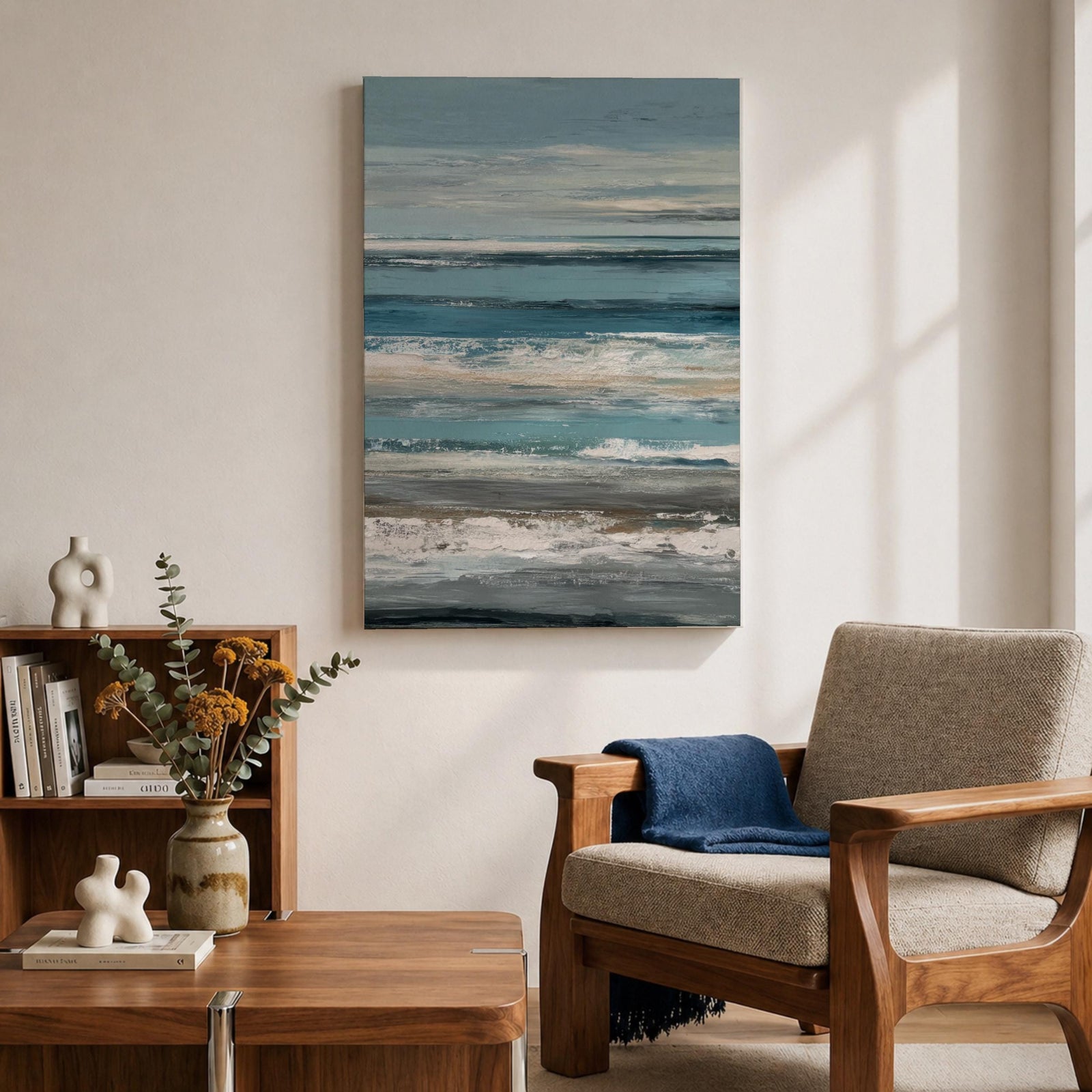 Create a calming retreat with this Ocean Wave Wall Art, featuring soft blue-gray coastal tones and layered abstract seascape textures. This serene canvas print captures the peaceful rhythm of the ocean, making it a beautiful addition to beach homes, bedrooms, living rooms, or coastal-inspired interiors.