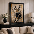 Striking gazelle wall art featuring a graceful antelope in motion with elegant curved horns against a contemporary abstract background. Wildlife artwork with dramatic black and gold tones, expressive splatter details, and luxurious gold accents, perfect for modern, safari, and nature-inspired interiors.