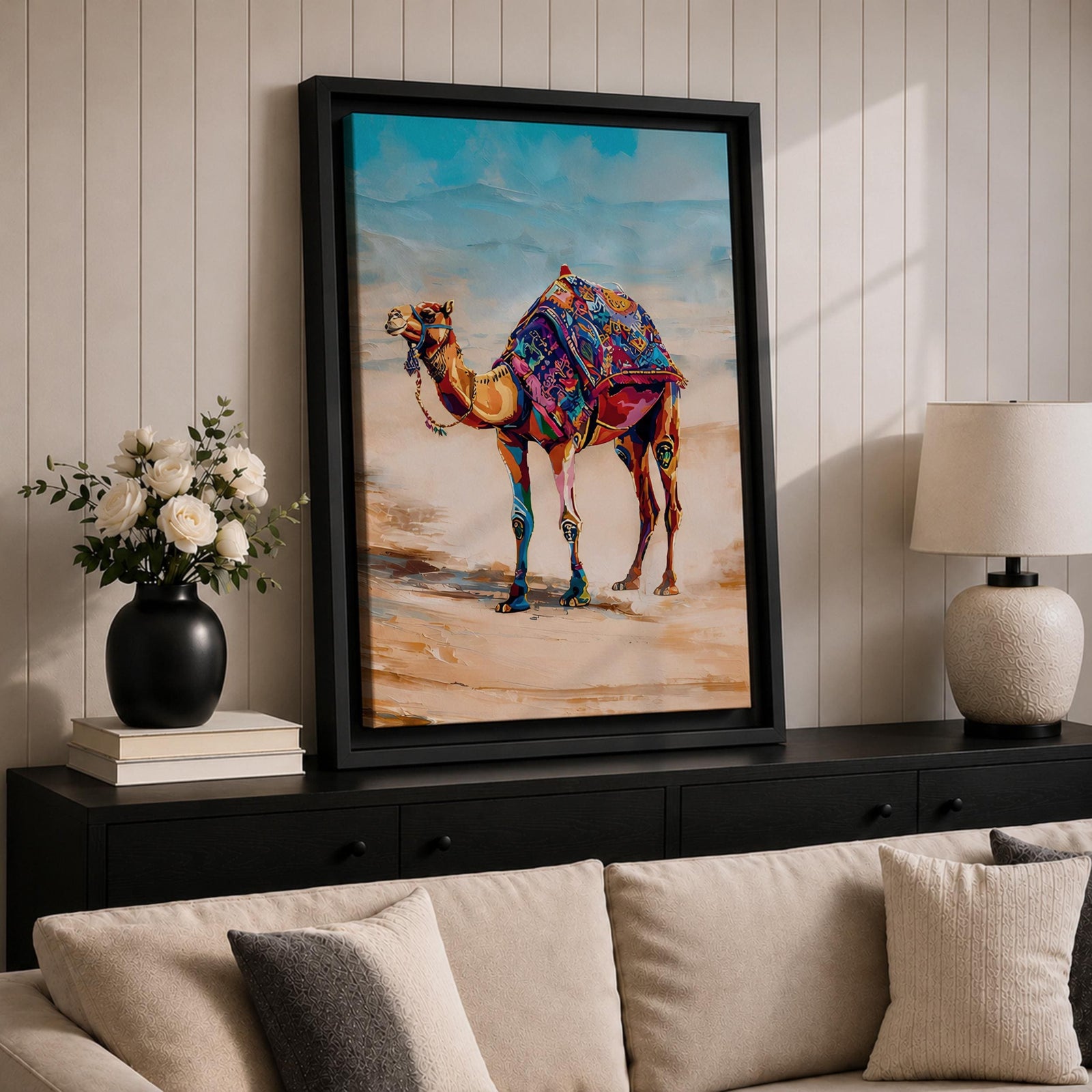 Bring vibrant desert charm into your home with this Camel Wall Art, featuring a beautifully adorned camel draped in colorful bohemian textiles against a serene desert landscape. This eye-catching canvas print blends rich jewel tones with contemporary painterly style, making it a striking focal point for living rooms, bedrooms, or boho-inspired spaces.