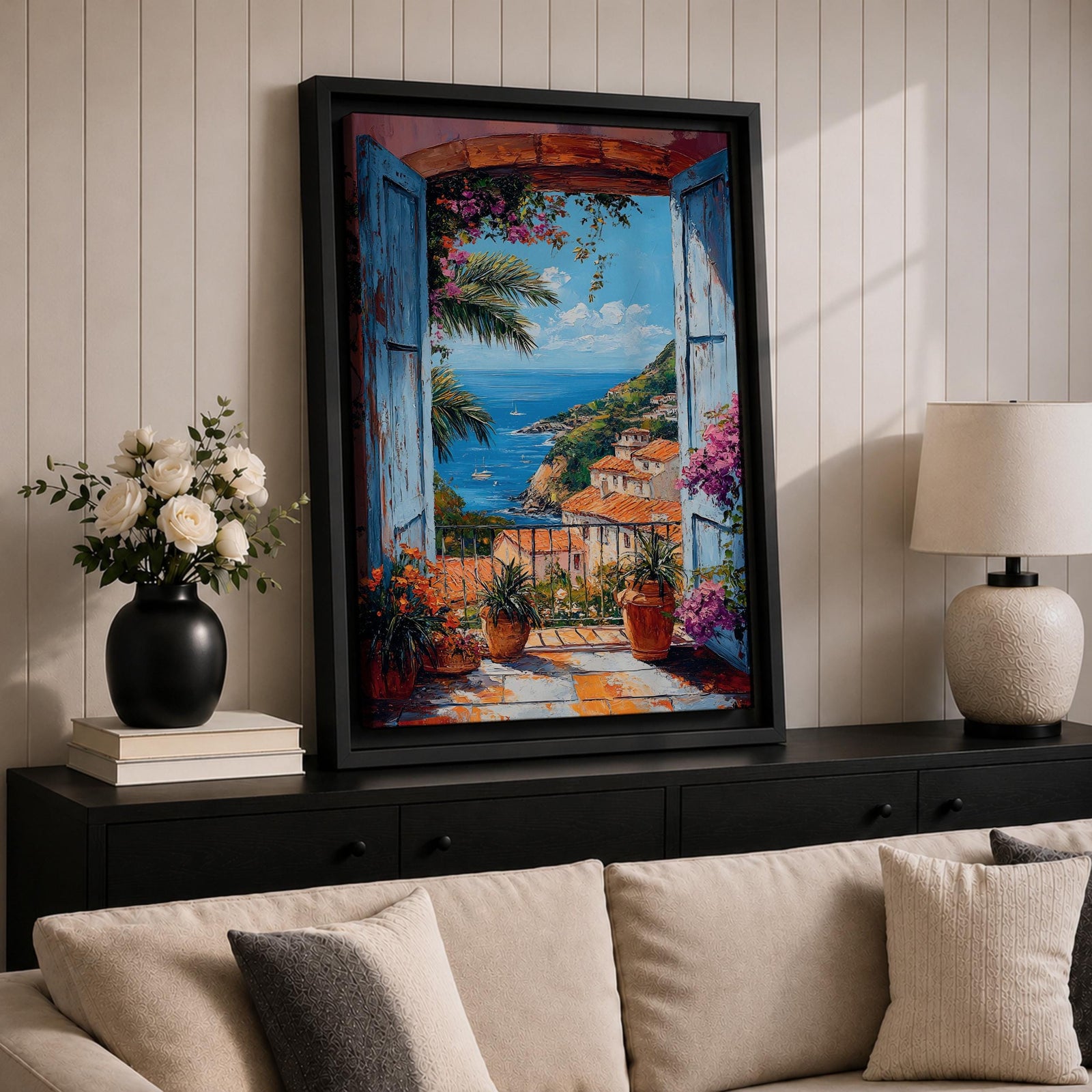 Colorful Mediterranean coastal village seen through open blue shutters overlooking a sparkling sea. Terracotta rooftops, blooming flowers, palm trees, and boats create a vibrant Italian seaside landscape in an impressionist-style framed canvas wall art.