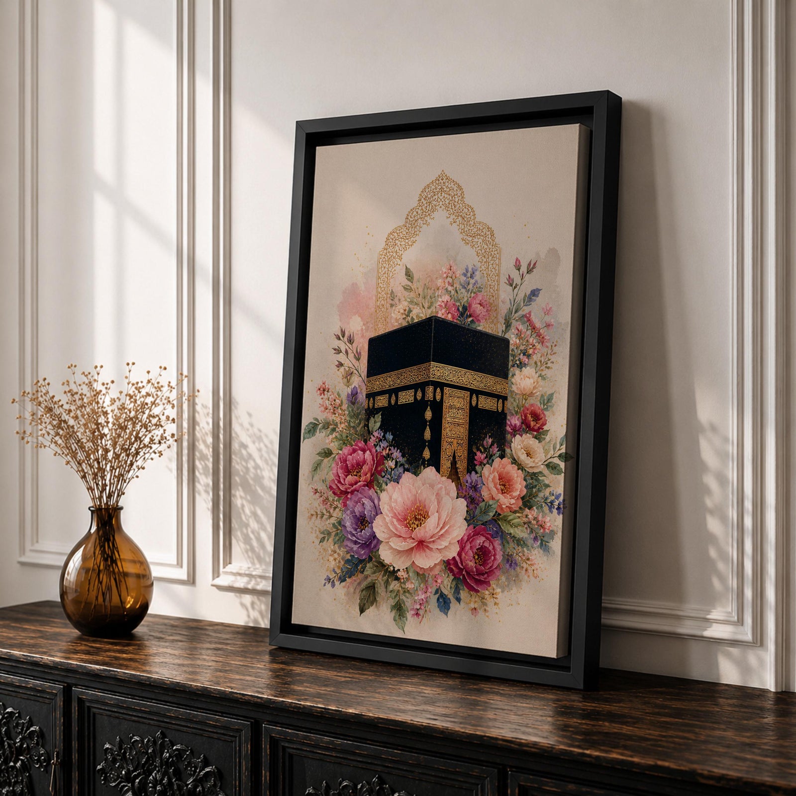 Elegant Kaaba wall art featuring the Holy Kaaba surrounded by blooming pink, blush, purple, and ivory flowers with delicate Islamic arch details. Soft watercolor tones and gold accents create a beautiful Islamic canvas artwork perfect for prayer rooms, bedrooms, and Muslim home decor.