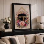 Elegant Kaaba wall art featuring the Holy Kaaba surrounded by blooming pink, blush, purple, and ivory flowers with delicate Islamic arch details. Soft watercolor tones and gold accents create a beautiful Islamic canvas artwork perfect for prayer rooms, bedrooms, and Muslim home decor.