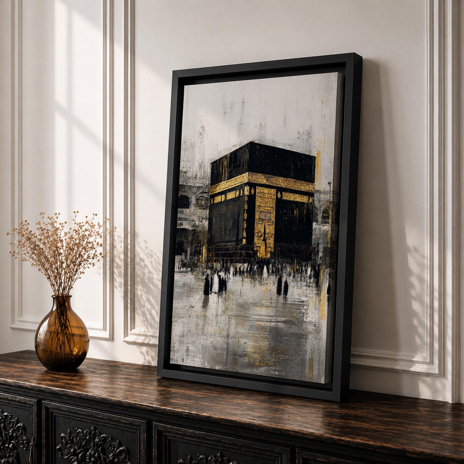 Elegant Kaaba wall art featuring the Holy Kaaba adorned with gold detailing, surrounded by worshippers in a textured abstract composition. Neutral black, gold, and ivory tones create a sophisticated Islamic canvas perfect for prayer rooms, living spaces, and Muslim home decor.
