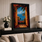 Mediterranean coastal landscape viewed through open wooden doors overlooking a bright blue sea. Colorful flowers, palm trees, sailboats, and hillside villas create a romantic Italian seaside scene in a vibrant impressionist framed canvas artwork.
