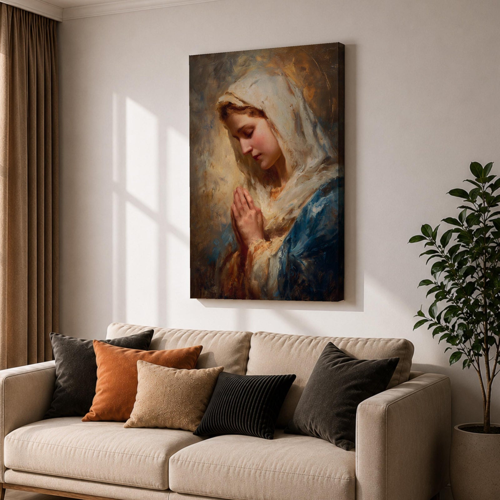 Sacred Catholic wall art featuring the Virgin Mary in prayer with hands clasped and eyes gently lowered. Soft golden light illuminates her serene expression, while rich blue garments and impressionist brushwork create a timeless devotional portrait ideal for prayer rooms and Christian homes.