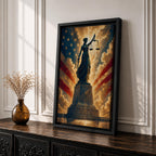 Dramatic Lady Justice wall art featuring the iconic blindfolded statue holding scales and sword before a radiant American flag backdrop. Golden light rays, patriotic colors, and classical legal symbolism create powerful artwork ideal for law offices, courtrooms, attorneys, judges, and government buildings.
