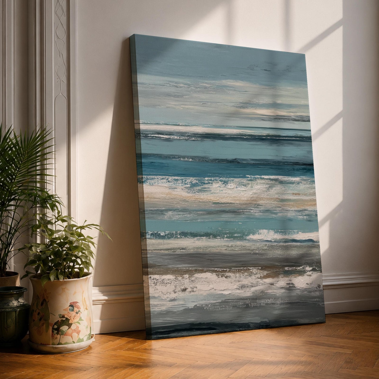Create a calming retreat with this Ocean Wave Wall Art, featuring soft blue-gray coastal tones and layered abstract seascape textures. This serene canvas print captures the peaceful rhythm of the ocean, making it a beautiful addition to beach homes, bedrooms, living rooms, or coastal-inspired interiors.